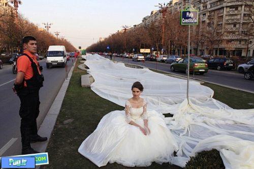 طولانی ترین لباس عروس دنیا به طول 2 مایل +عکس